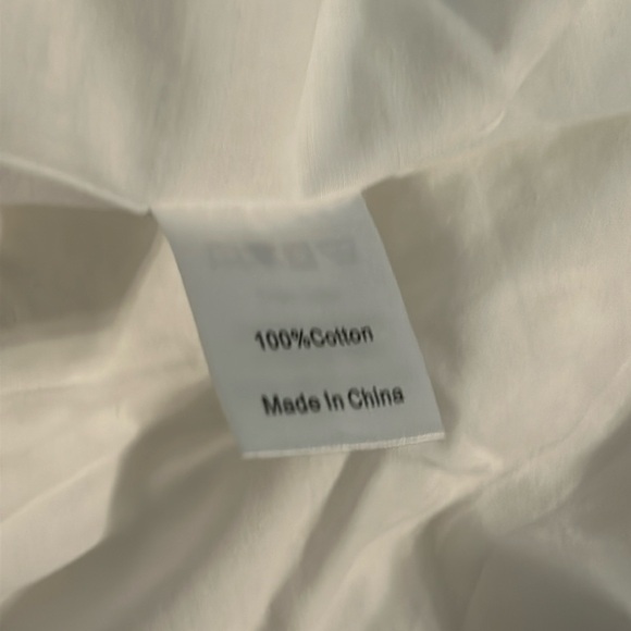 White Eyelet Finley Flutter Sleeve Top
TUCKERNUCK - Picture 8 of 11